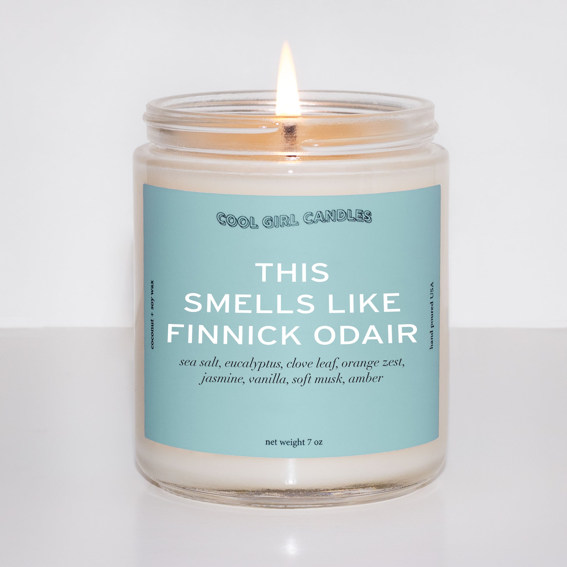 finnick odair scented candle. A sea green colored candle label with aquatic scent notes for Finnick Odair Fans