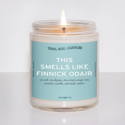 finnick odair scented candle. A sea green colored candle label with aquatic scent notes for Finnick Odair Fans