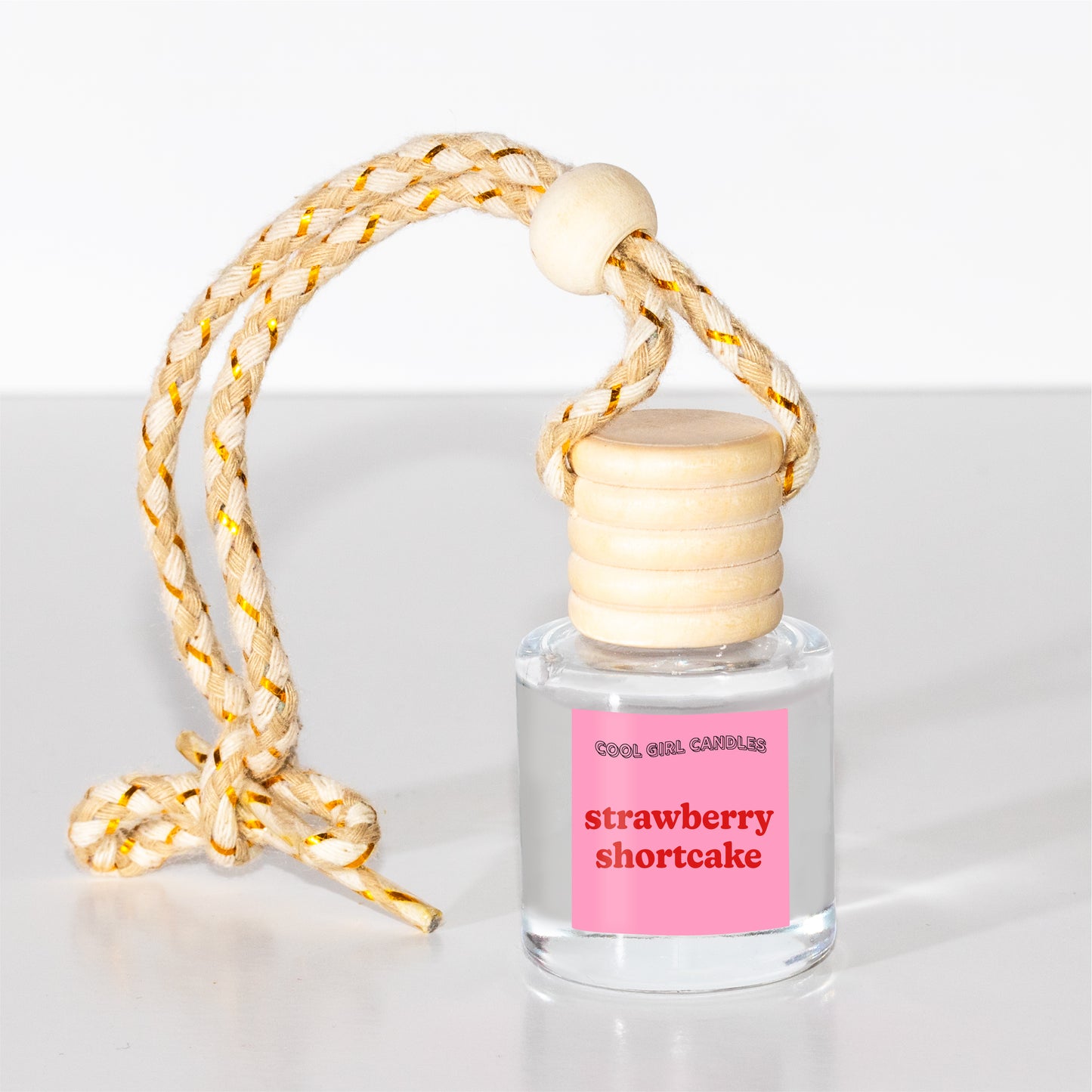 strawberry shortcake scented hanging car freshener that smells fruity