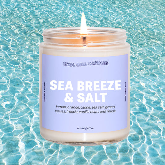 sea breeze and salt candle by cool girl candles is a coastal seaside inspired candle with notes of lemon, orange, sea salt, and ozone. This candle smells zen and calming like a coastal seaside escape.