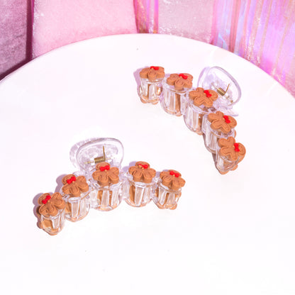 Cute hair accessory for Christmas shaped liked a Gingerbread man. The perfect holiday christmas gift for long hair