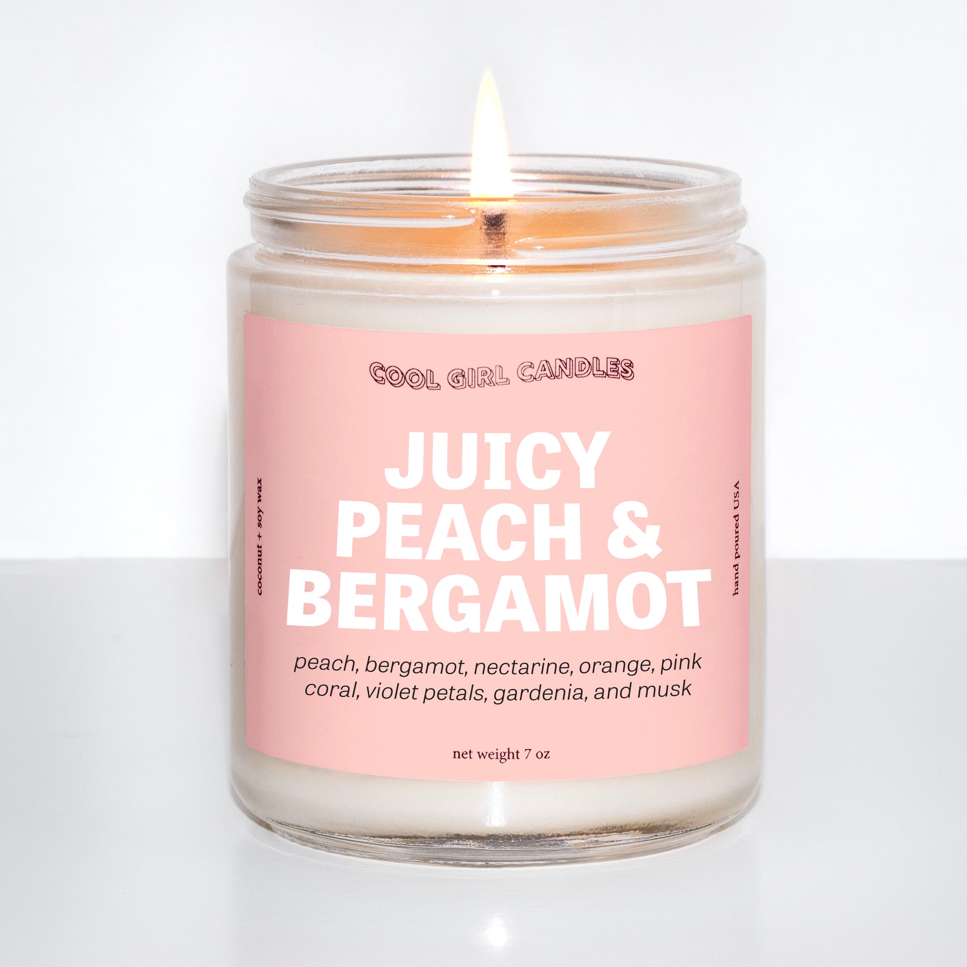 Juicy peach and bergamot candle is a delicious, sweet, fruity, peachy candle with citrusy bergamot notes that instantly smells like summer. It's the perfect fruity candle for summer! It has soft floral and musk notes to round out the scent and complement the fruitiness. Made by cool girl candles