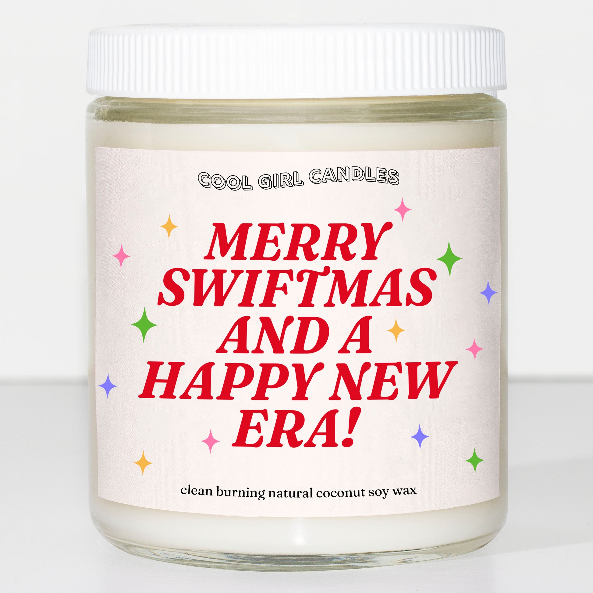 Taylor Swift holiday candle that says Merry Swiftmas and a Happy New Era made by cool girl candles