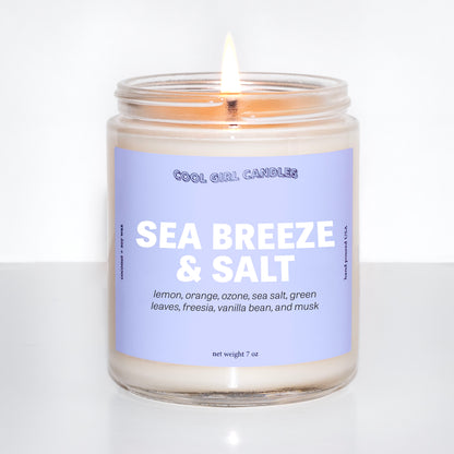 sea breeze and salt candle by cool girl candles is a coastal seaside inspired candle with notes of lemon, orange, sea salt, and ozone. This candle smells zen and calming like a coastal seaside escape.