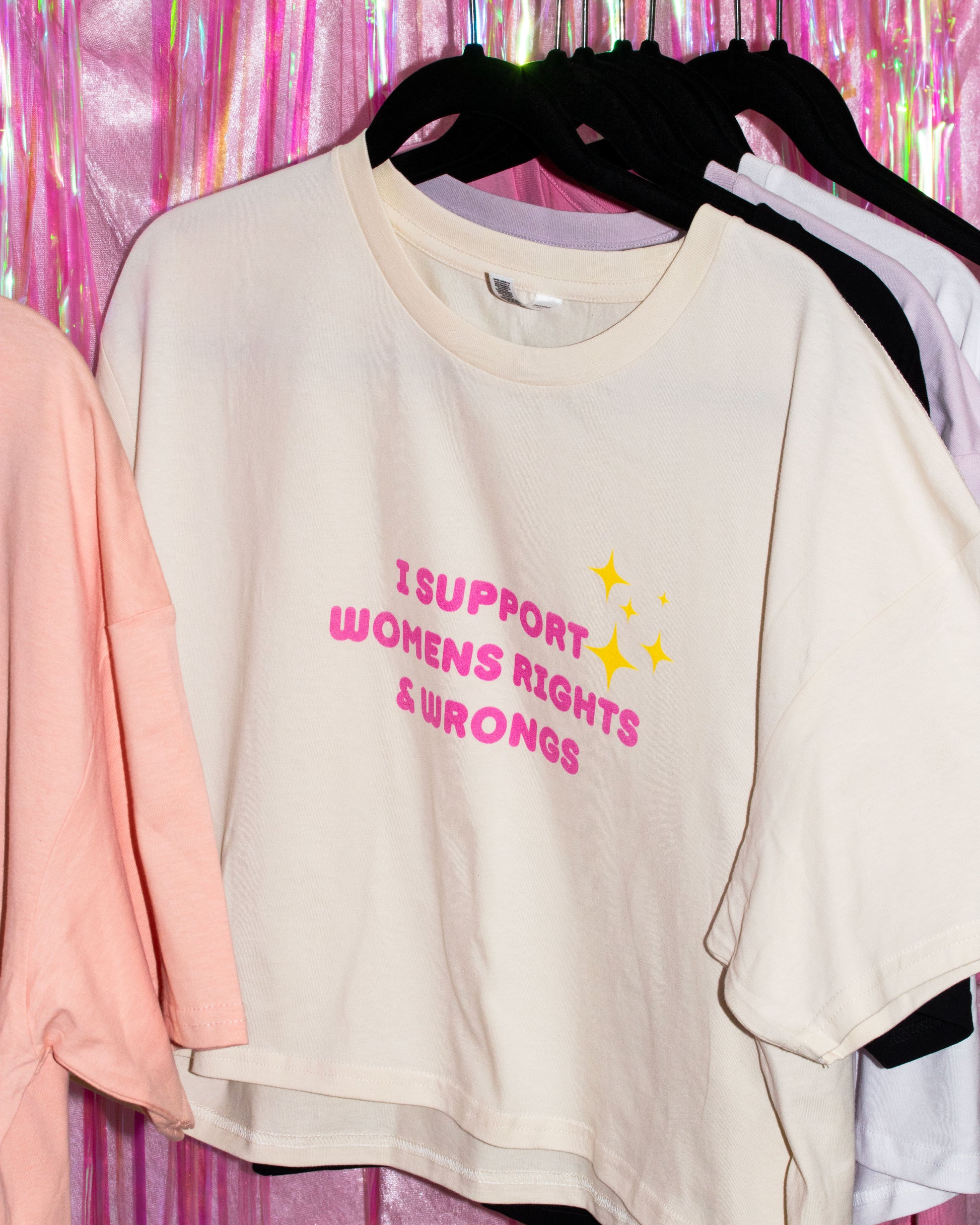 cute cream crop top that says I support women's rights and wrongs made by cool girl candles apparel