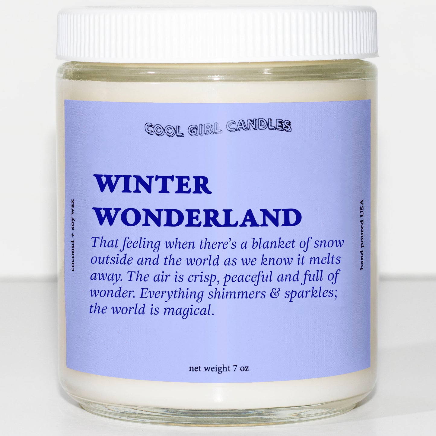Winter wonderland candle by cool girl candles a blue colored holiday candle that's the perfect festive gift for the holidays