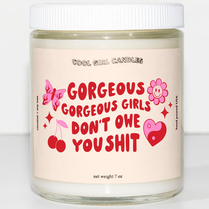 Gorgeous gorgeous girls don't owe you shit candle. A cheeky and funny candle that makes for the perfect gift for your best friend by cool girl candles 