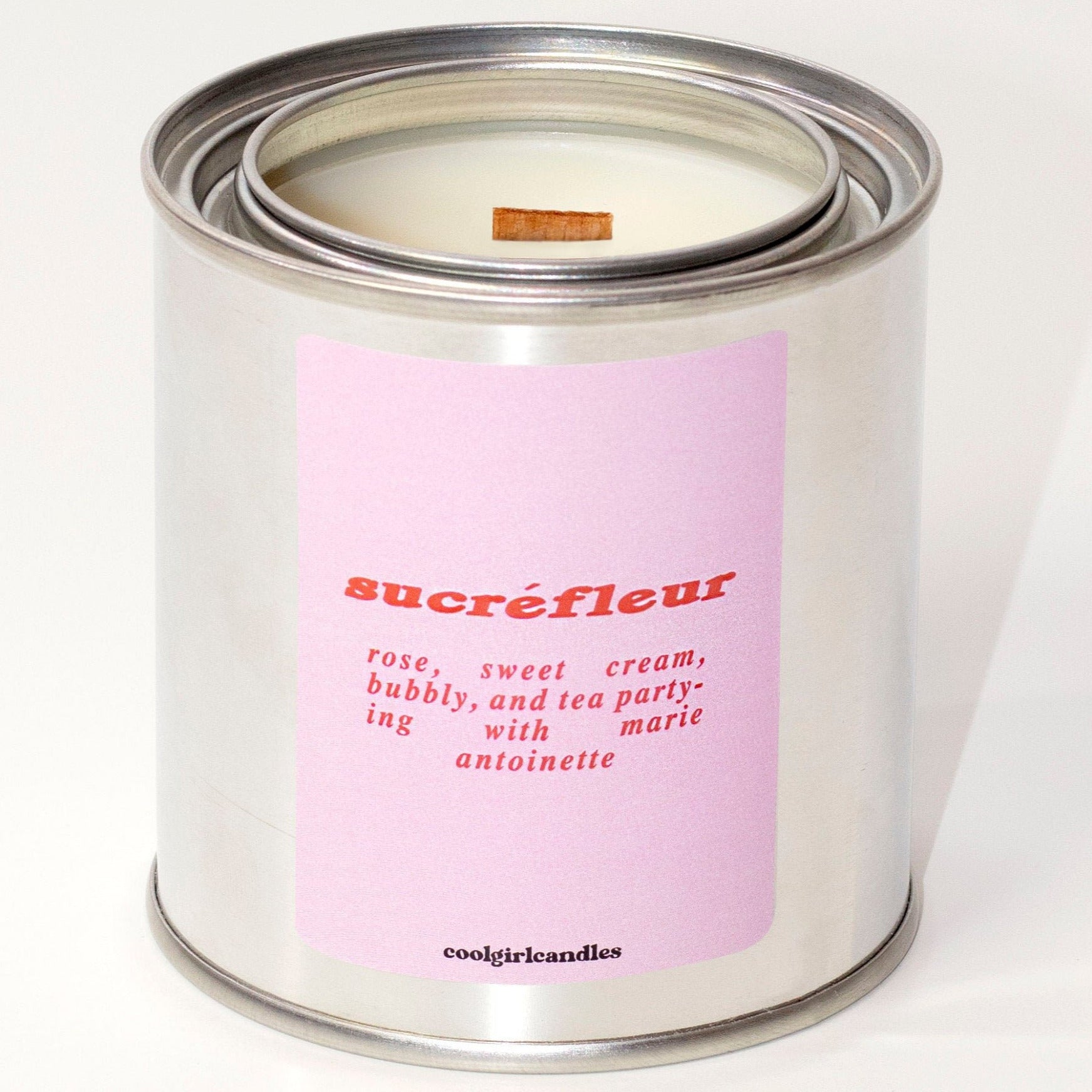 Floral scented candle by cool girl candles. Sucrefleur smells floral, sweet, and sparkly for an effervescent scent that fills the room.