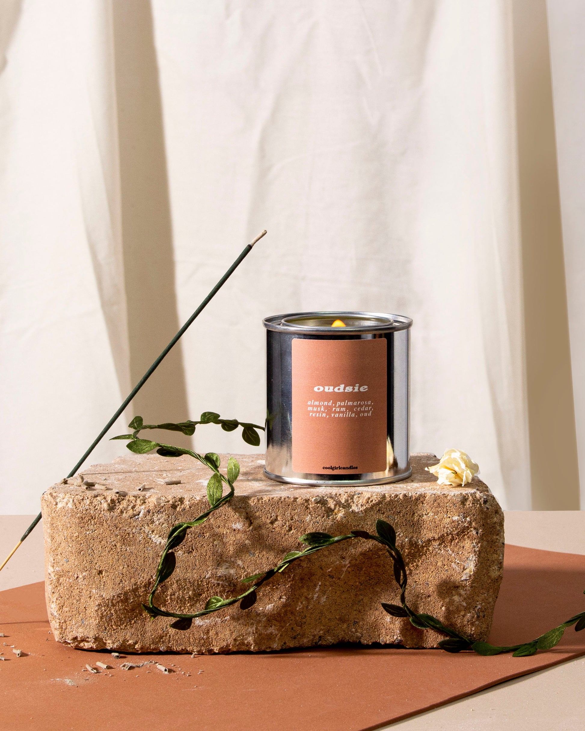 Cool Girl Candles Oud Candle. Paint can candle. Luxury home fragrance candle that smells like oud. best Oud candle. Aesthetic fall candle neutral home decor candle nudes